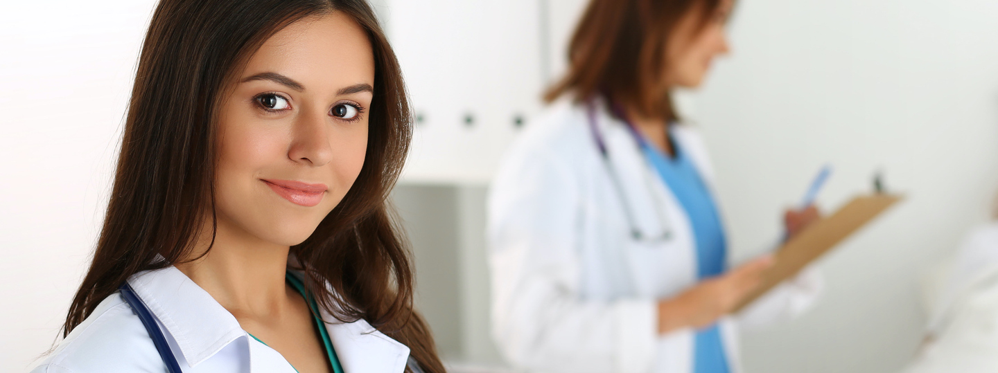 Beautiful female medicine doctor looking in camera